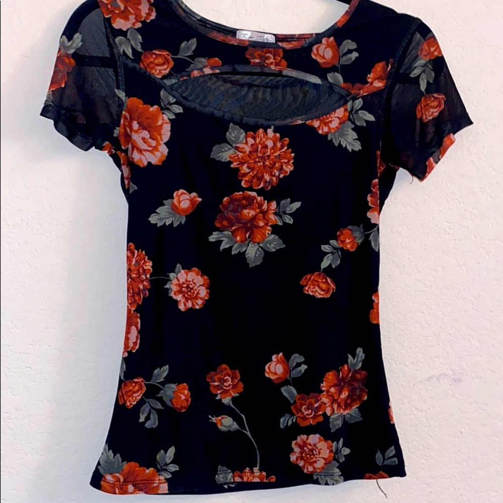 A black shirt with roses.